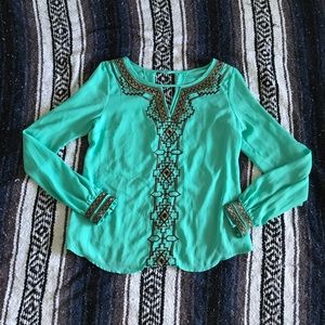 Francesca’s tribal print top